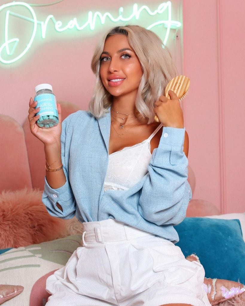 Sugar Bear Hair Vitamins With Model